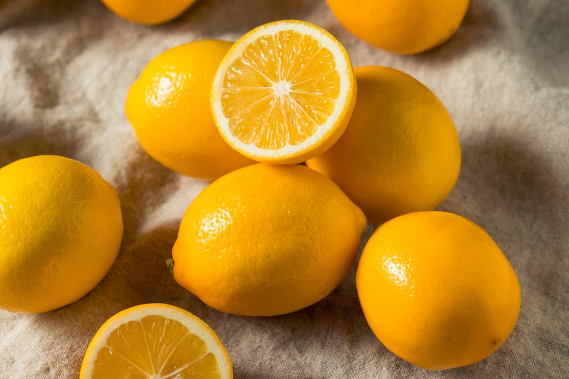 Raw Yellow Organic Meyer Lemons in a Bunch